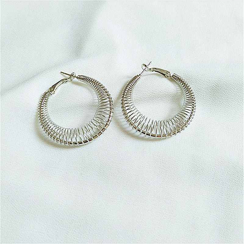 Gold Spring Curve Earrings