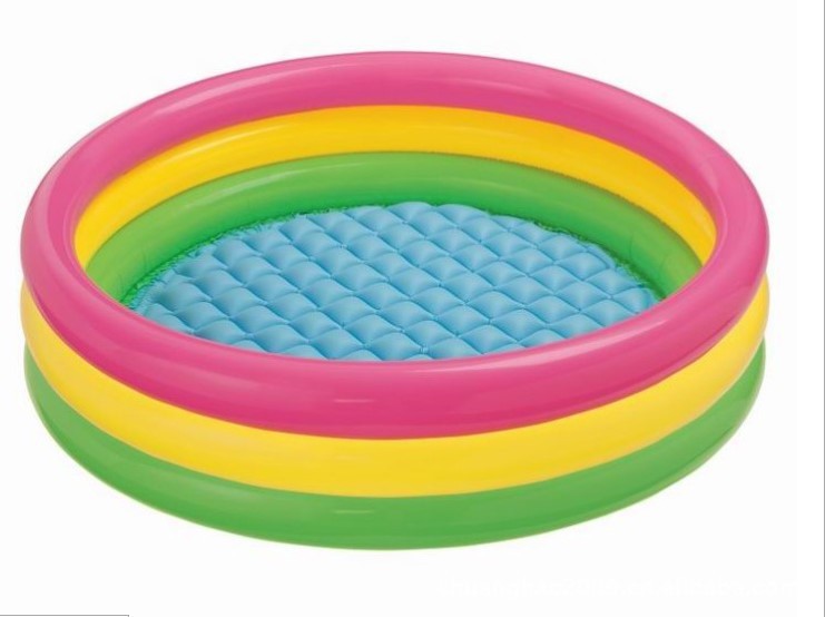 Children Playing in Inflatable Pool