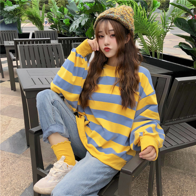 Model Wearing Striped Hoodie