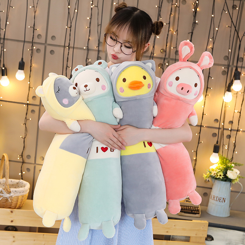 Plush animal pillow in yellow