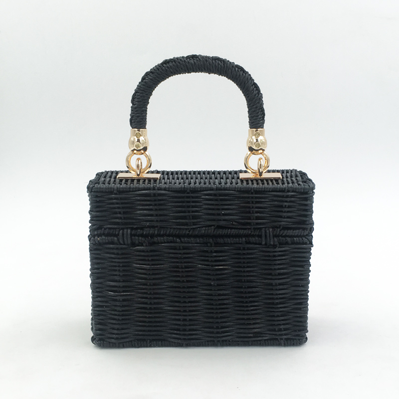 Stylish straw bag in use