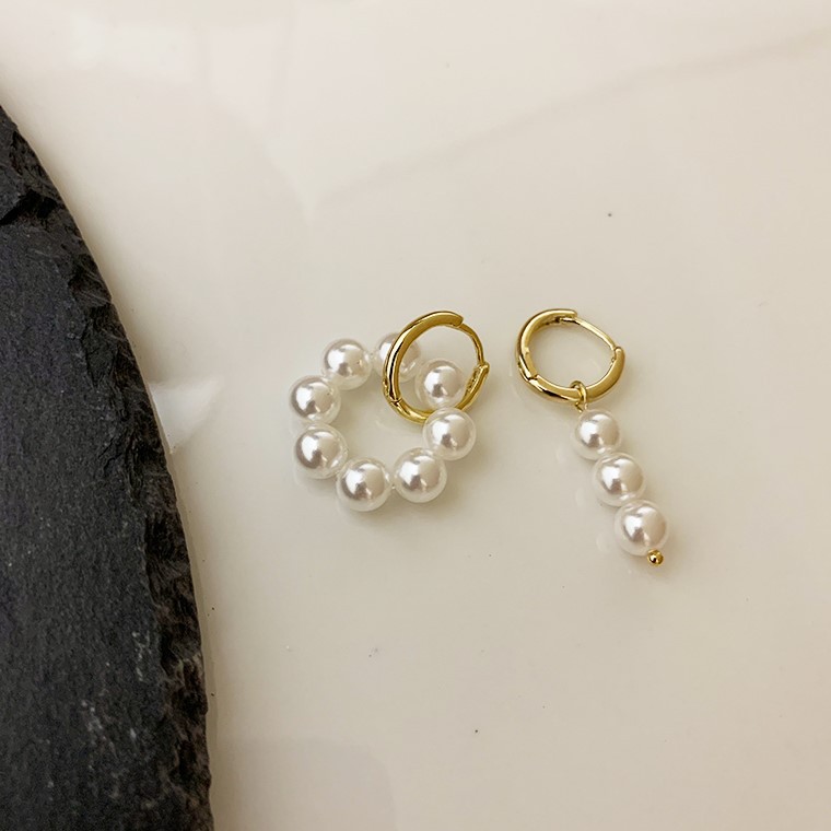 Pearl Earrings Close-Up Image