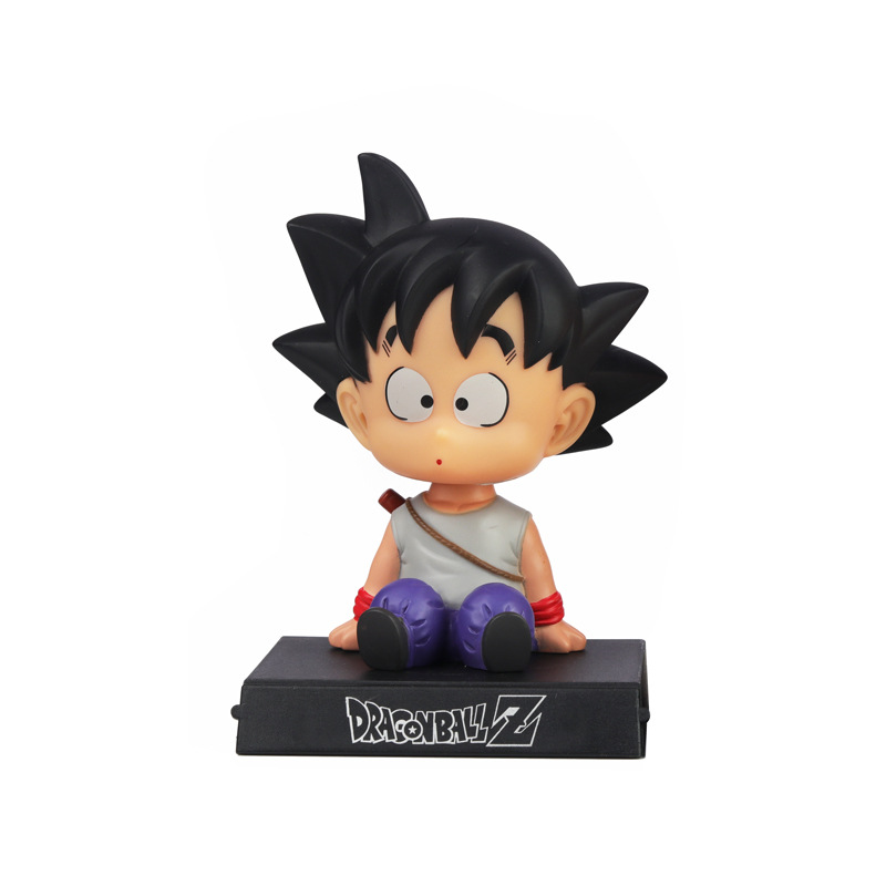 Son Goku Shaking Head Figurine in Car