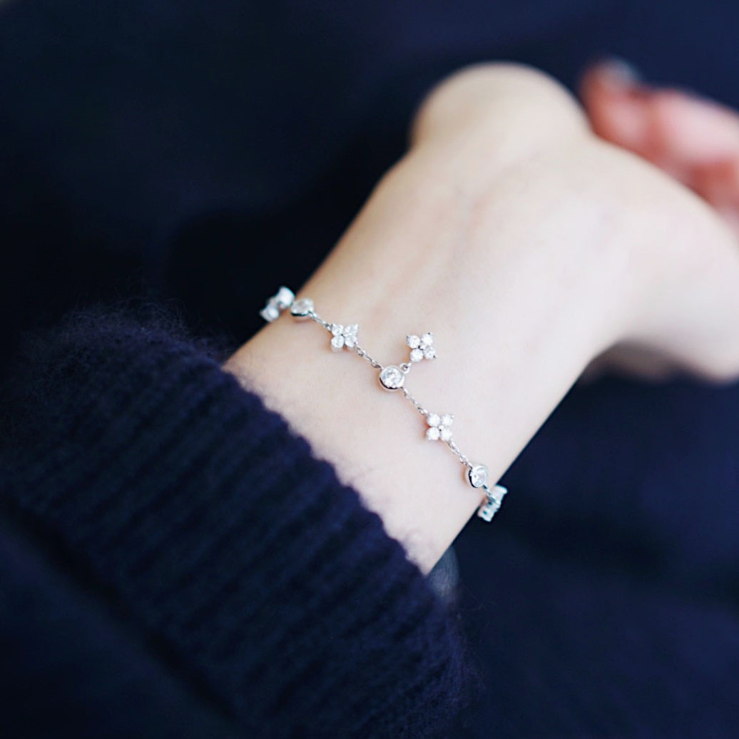 Gulpläterat fyrklöverarmband