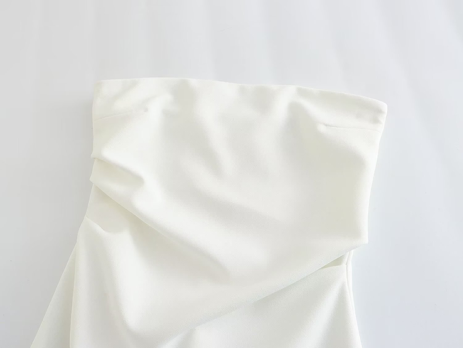 Off-shoulder dress on model 3