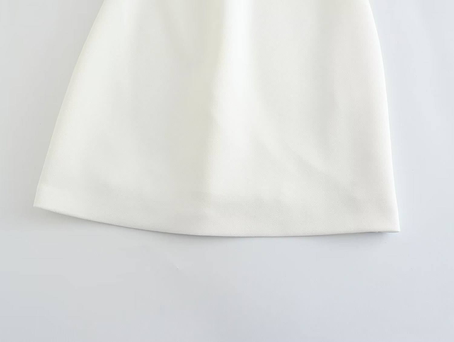 Off-shoulder dress on model 2