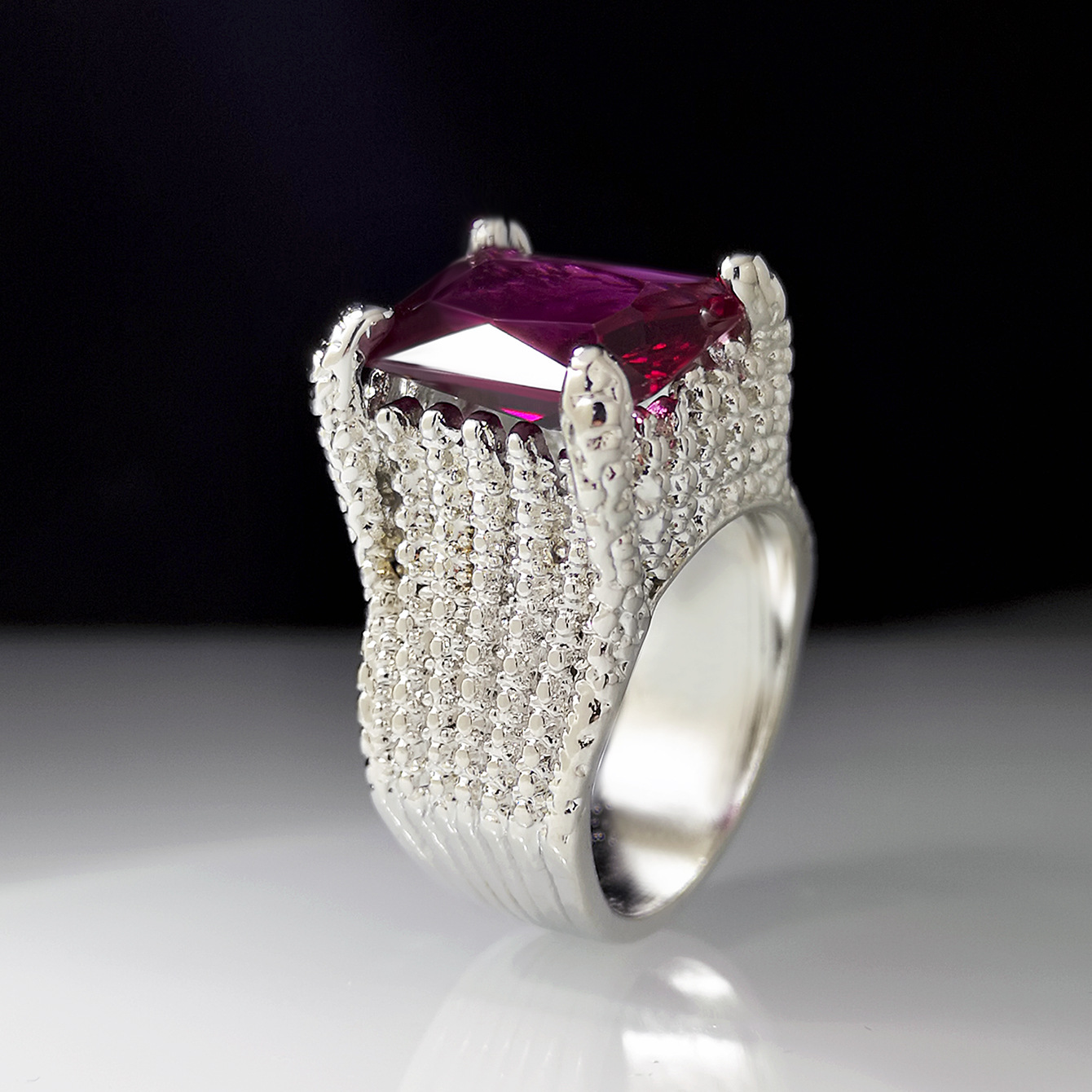 Square Ruby Ring in Hand