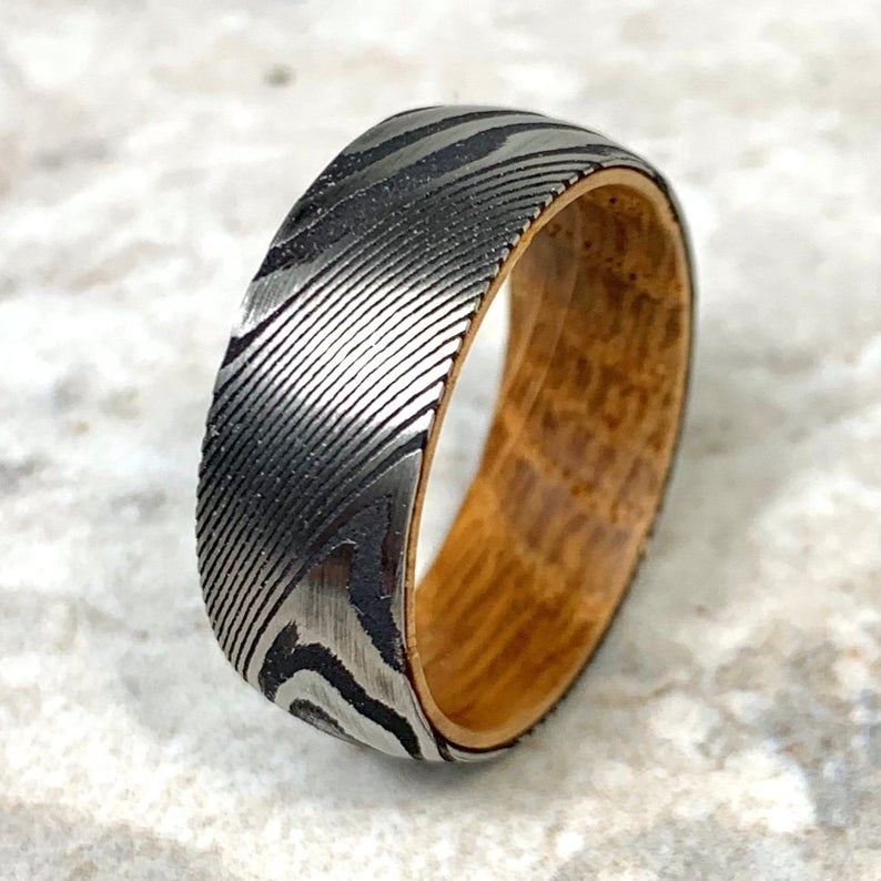 Grey Ceramic Deer Antler Men's Ring on display