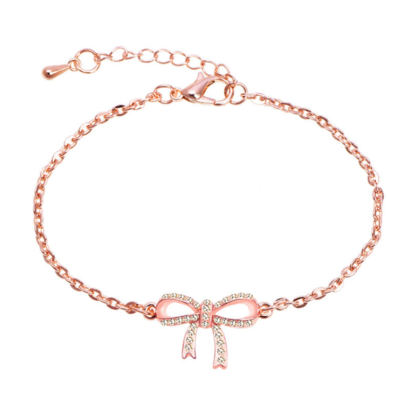 Rose Gold Bow Hand Jewelry Image 1