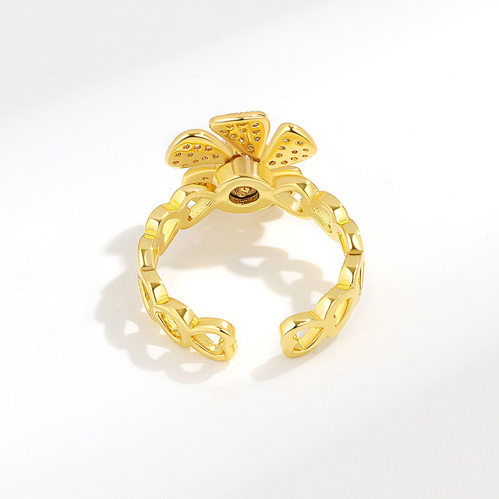 Women's Simple Fashion Micro Inlay Rotatable Flower Ring - Platinum