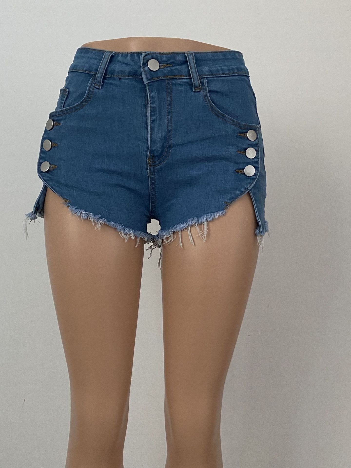 Model wearing denim shorts