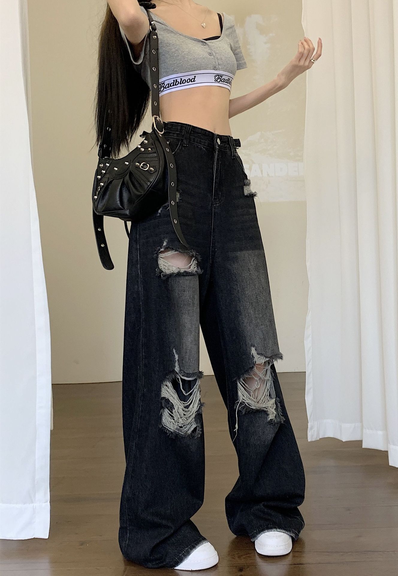 Back View of Black Ripped Jeans