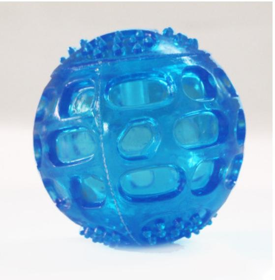 Puppy Playing with Thorn Ball