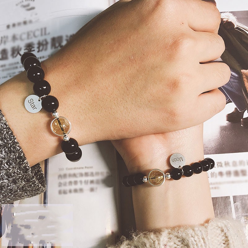 Bracciali di coppia con cristalli naturali e design ispirato all’amore