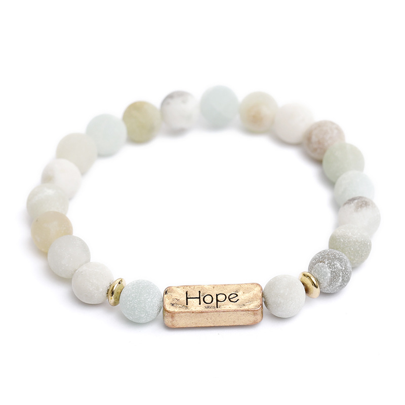 Natural Stone Engraved Hope Bracelet in Use