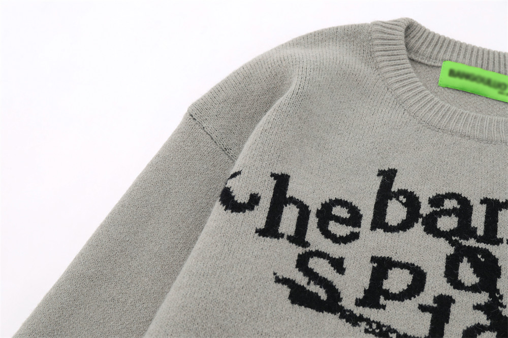 Grey Sweater on a Model